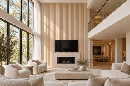 Double-height living room with a light oak scalloped feature wall behind the fireplace and TV
